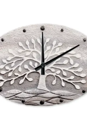 Sconto Orologio ovale con bassorilievo con retro in legno massello